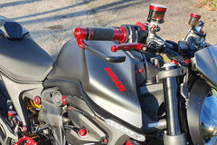Adapter to install brake and clutch lever protection., Black