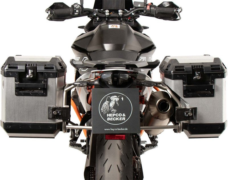 Hepco & Becker Side Carrier Cutout Stainless Steel Incl. Xplorer Silver Sideboxes For KTM 890 SMT (2023-) | 6517655 00 22-00-40