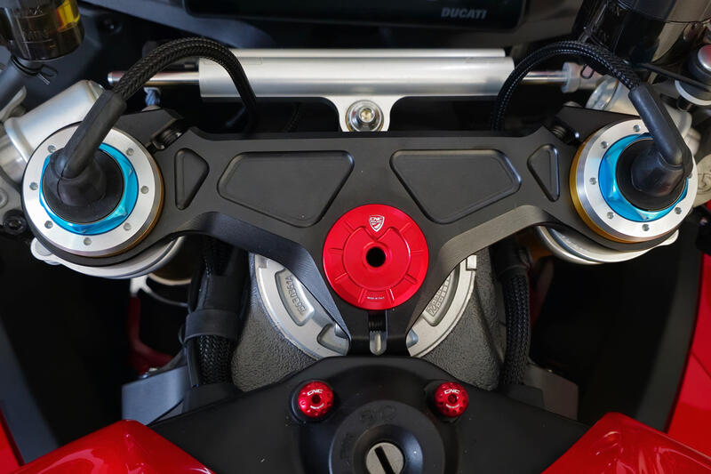 Triple clamps - top plate nut cap