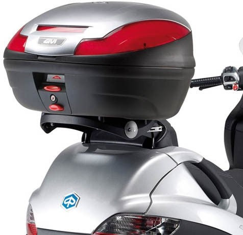 Givi Monolock Top Case Rack SR134 for Piaggio Mp3 125-250-300-400 06-11, Mp3 Touring 300/400 11, Mp3 Business/Sport 500 12-13, MP3 300 Business/Sport 12-14, plates and backrest included | SR134M